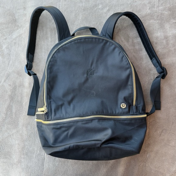 black and gold lululemon backpack Delta Gamma Everywhere 22L Side Pockets For Quick Access To Water Bottle And Small Items Black Shiny Gold City Adventurer